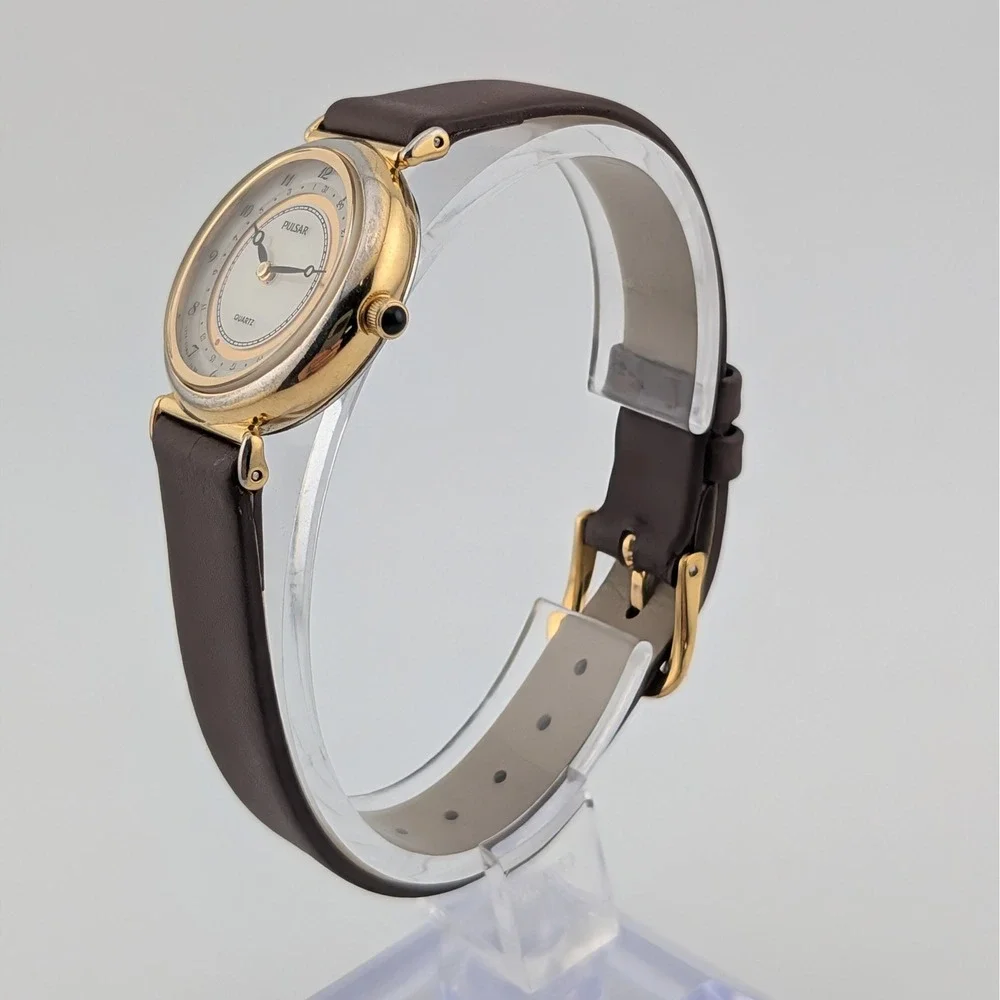 Pulsar V249-0030 Date Pointer Gold Tone White Dial Brown Leather Women's Watch